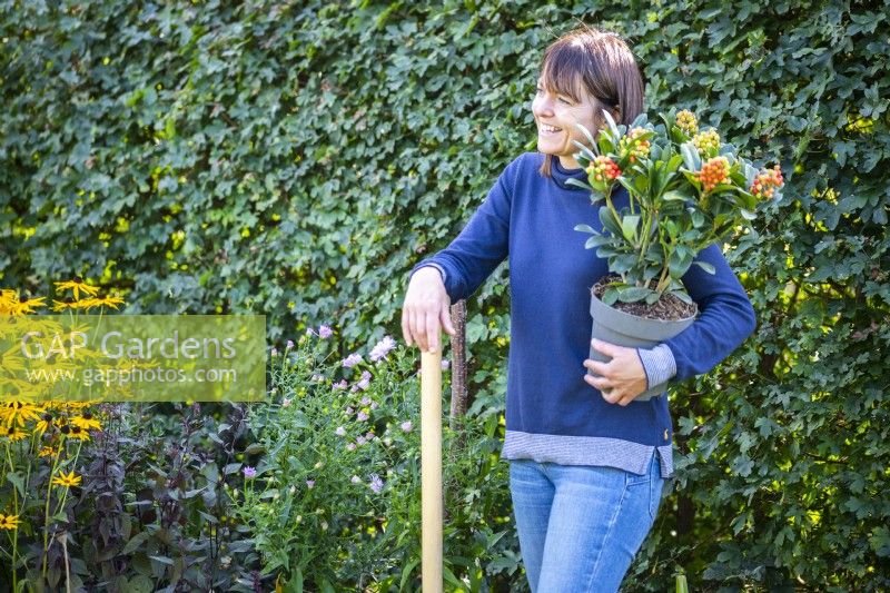 Woman talking while gardening