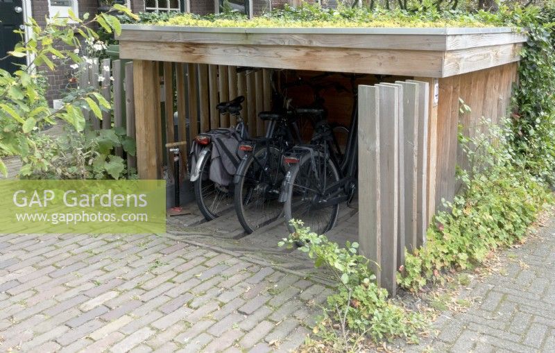 Shed to storage the bicycles in the front garden.