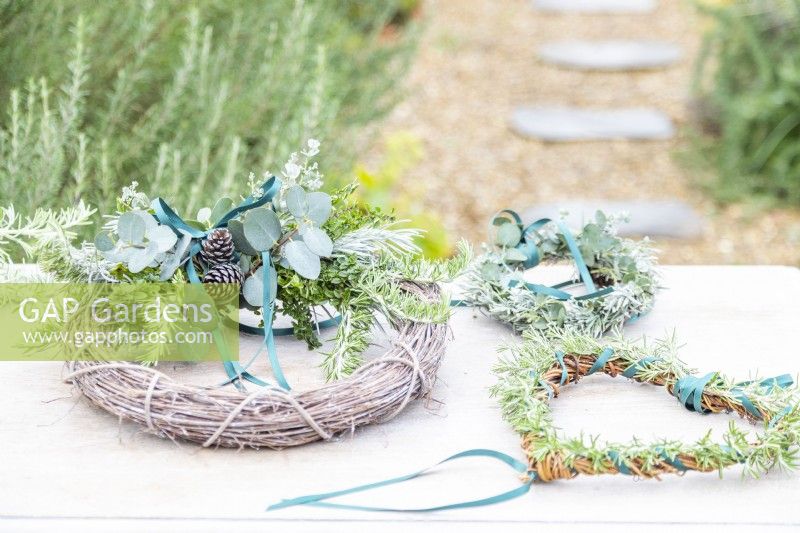 Scented wreaths lying on table
