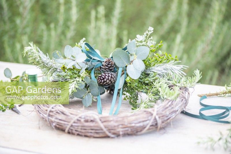 Scented wreath lying on table