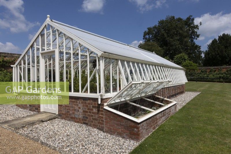 Large traditional greenhouse with cold frame alongside