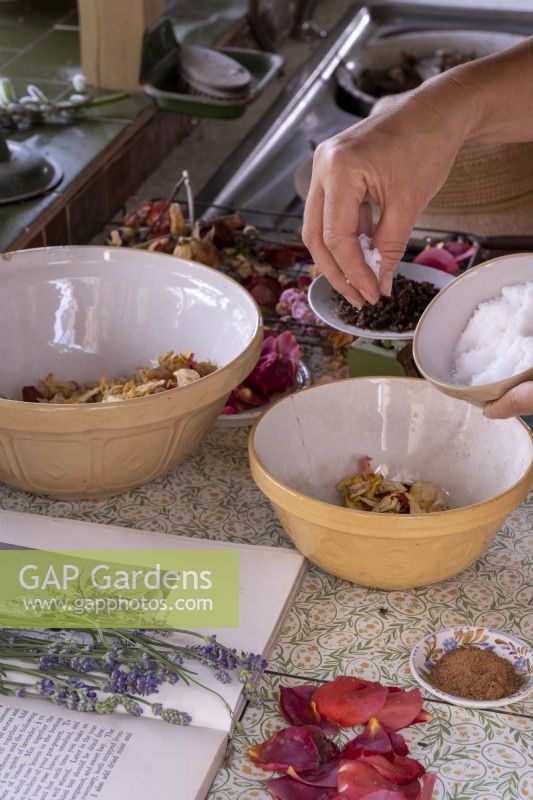 Step by step of making pot pourri, mixing ingredients