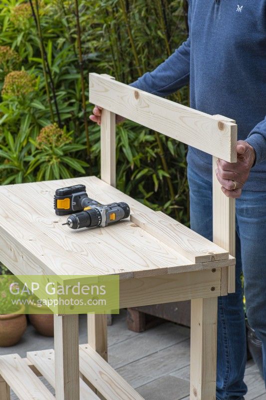 Step-by-Step Making a Potting Bench. Step 11: adjust the height of the top rail, prior to screwing into position