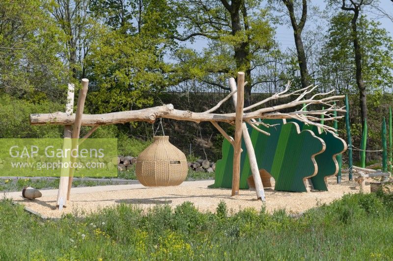 Torgau, Sachsen, Germany 
LAGA Landesgartenschau Torgau 2022 State garden show.
Idiosyncratic playground made of natural materials with a weaved corf. 