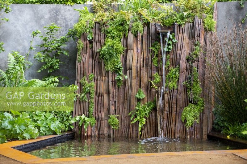 Feature waterfall with lush green planting made from Medite Smartply, a sustainable and innovative wood-based panel product -  Medite Smartply Building the Future, RHS Chelsea Flower Show 2022