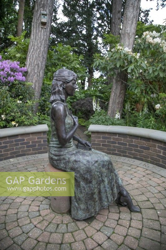 'The Secret Sits' - a bronze figure at Hamilton House garden in May 
