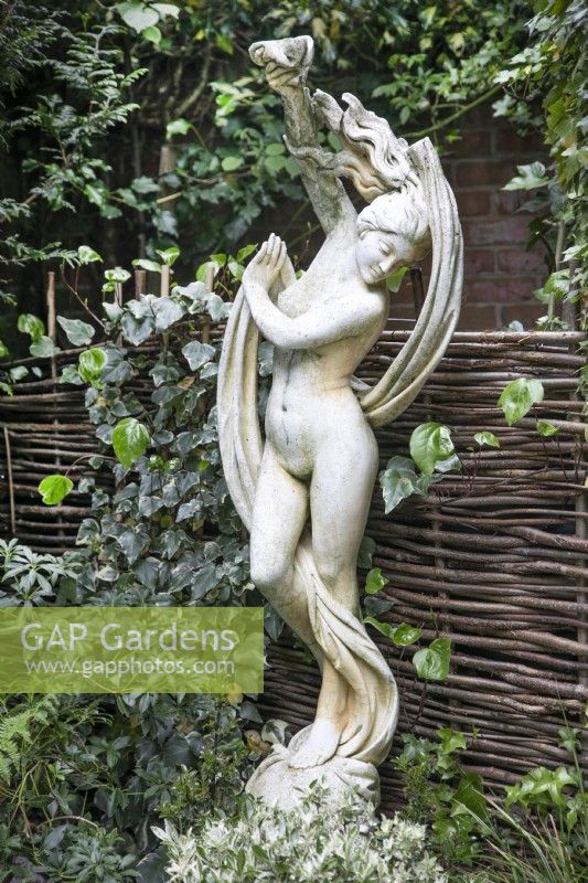 Female sculpture at Hamilton House garden in May 
