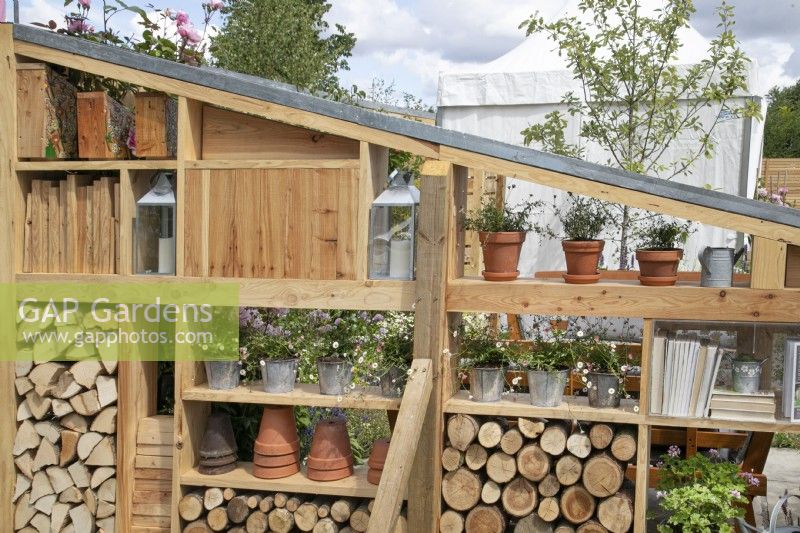 Outdoor storage space in #knollingwithdaisies garden at RHS Hampton Court Palace Garden Festival 2022