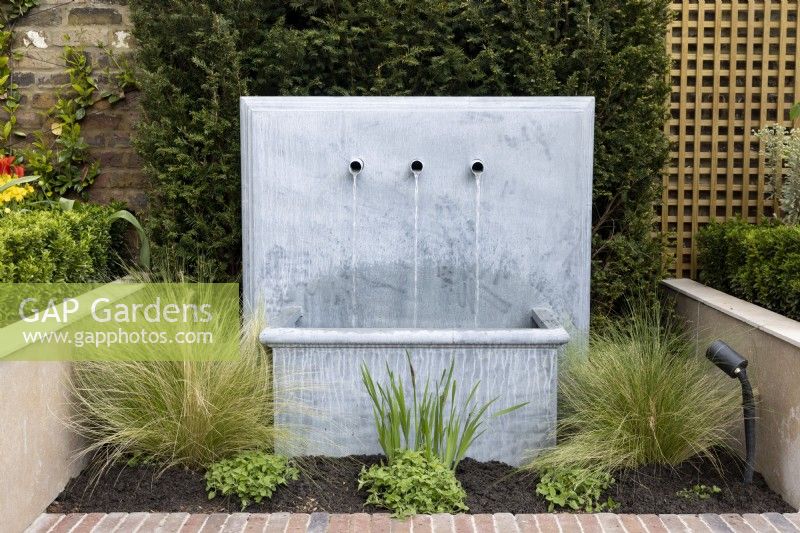 Contemporary water feature in suburban garden