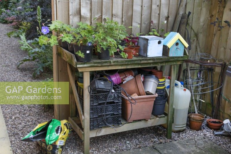 Potting bench and storage area in suburban garden