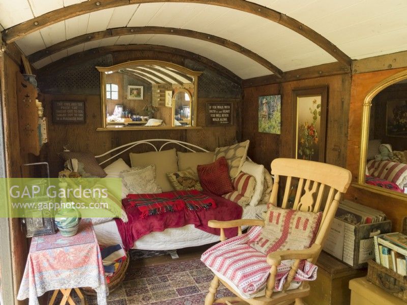 Interior of old railway carriage converted into summer house