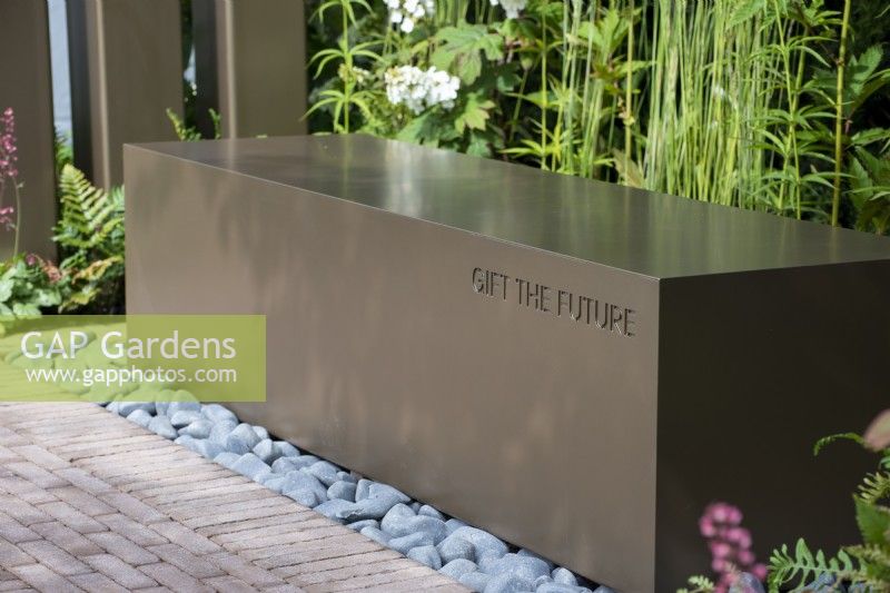 Metal bench - Macmillan Legacy Garden: Gift the Future - RHS Hampton Court Flower Festival 2022