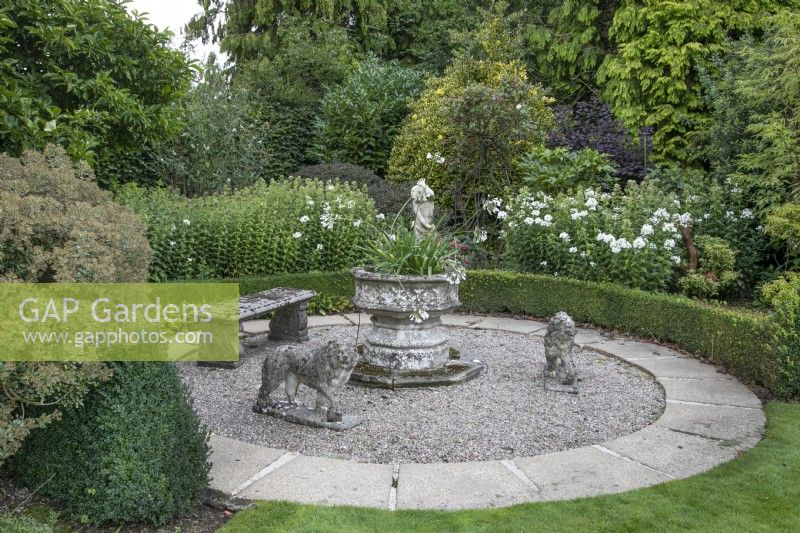 Circular seating area at The Burrows Gardens, Derbyshire, in August