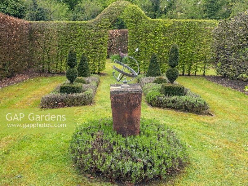 Armillary Sun Dial with Clipped Buxus - Box - hedging and topiary .