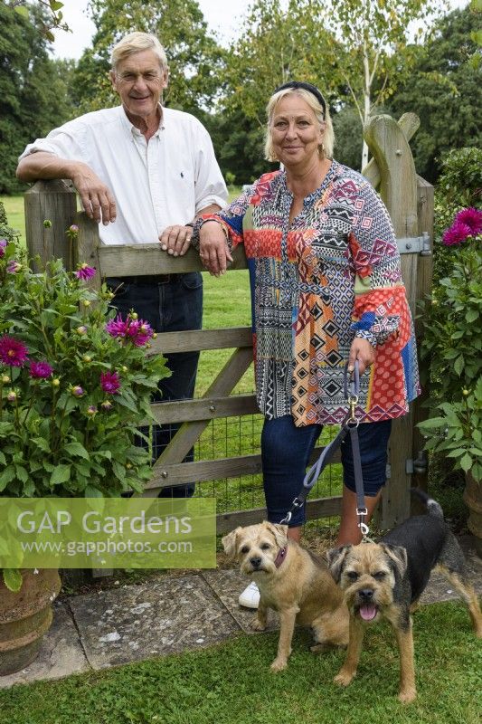 Ann and John Thompson-Ashby with their border terriers Tiggy and Tod