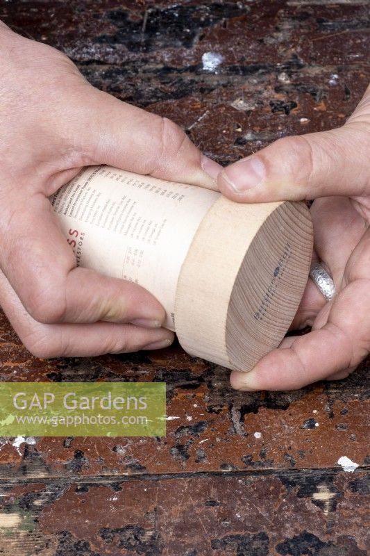 Making biodegradable plant pots with old newspaper