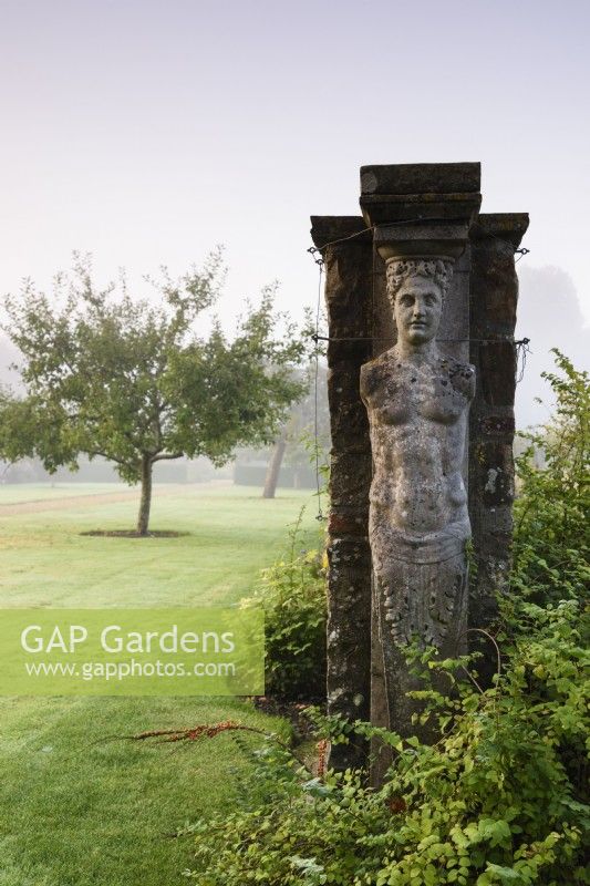 Caryatid in the walled garden at Parham House in September