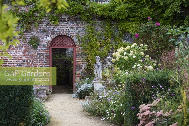 Doorway in the walled garden at Parham House in September