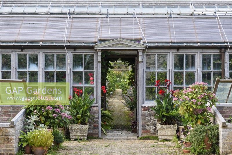 Teak glasshouse at Parham House Garden in September