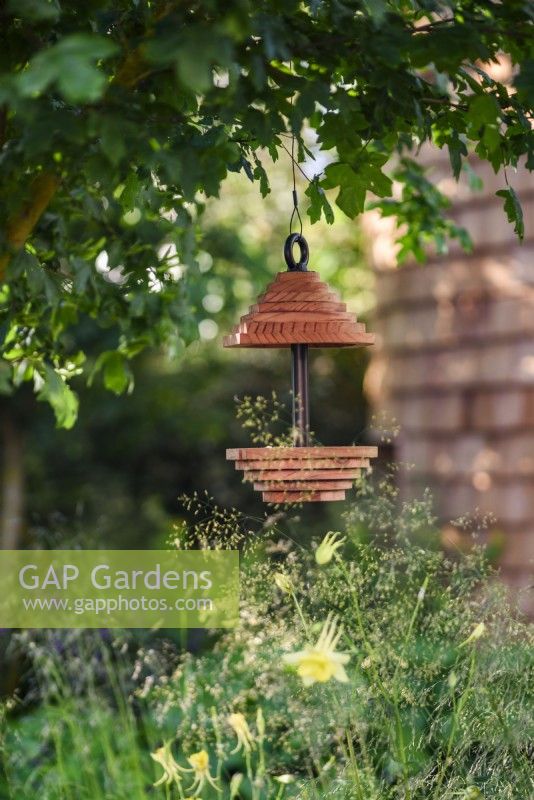 Bird feeder in Horatio's Garden, Designer: Charlotte Harris and Hugo Bugg, Gold medal winner, Best Show Garden, Chelsea Flower Show 2023 