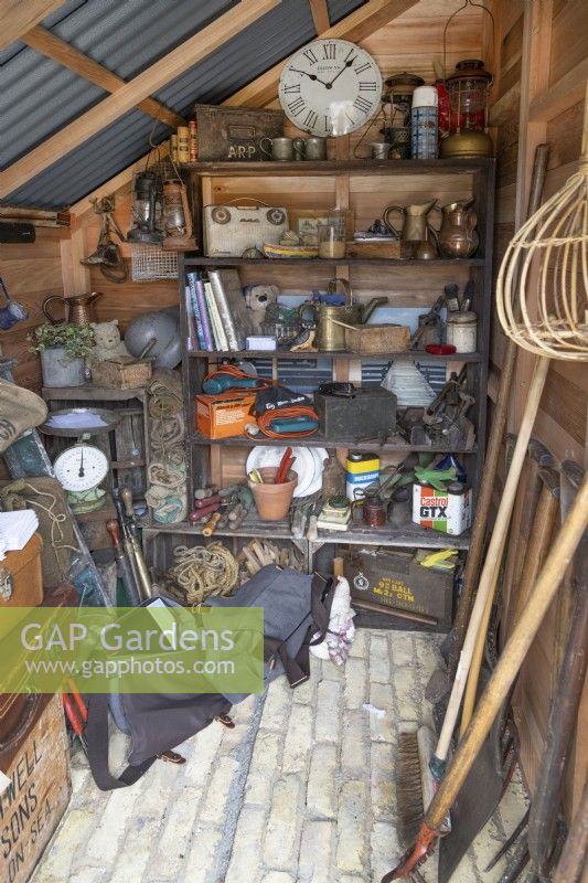 Wooden shed full of tools 