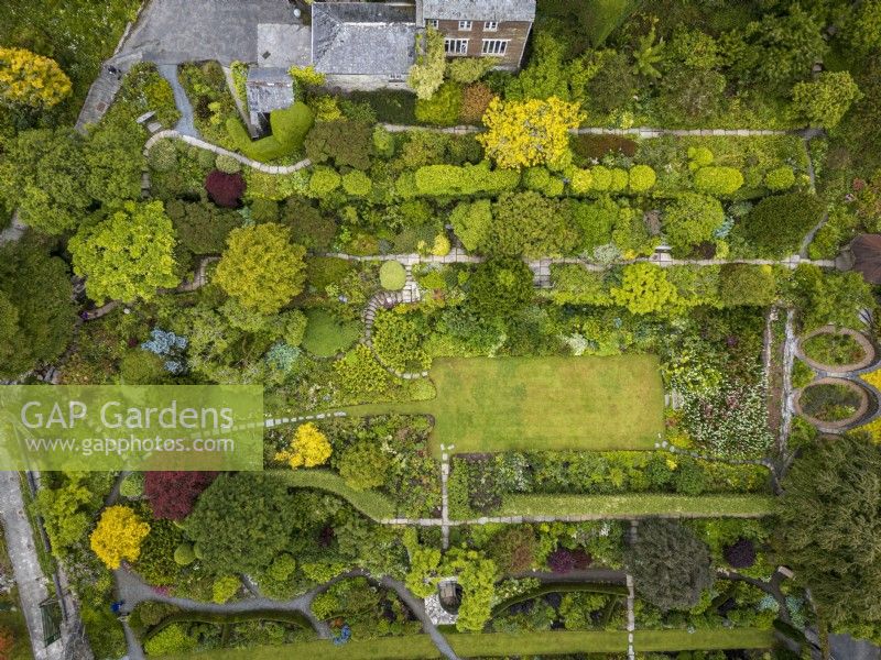 Aerial view of The Garden House in Devon showing the layout of the garden across the terraces