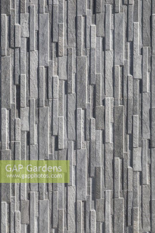 Grey tiled external wall 