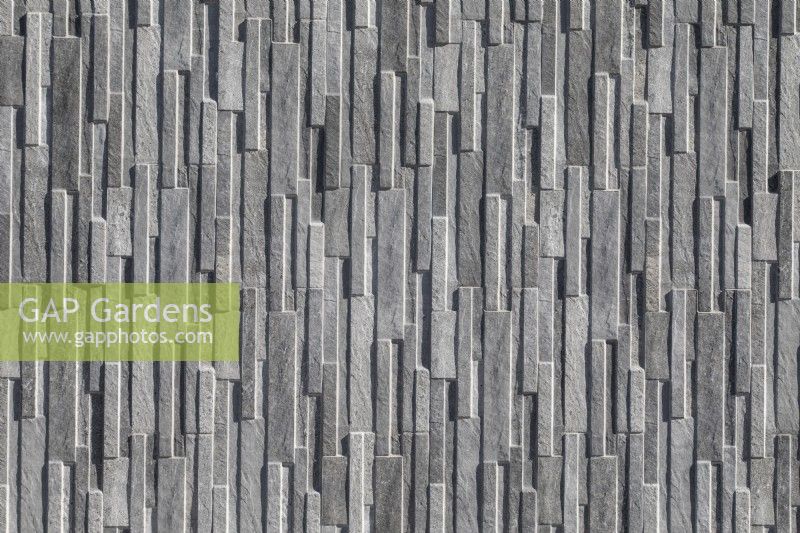 Grey tiled external wall 