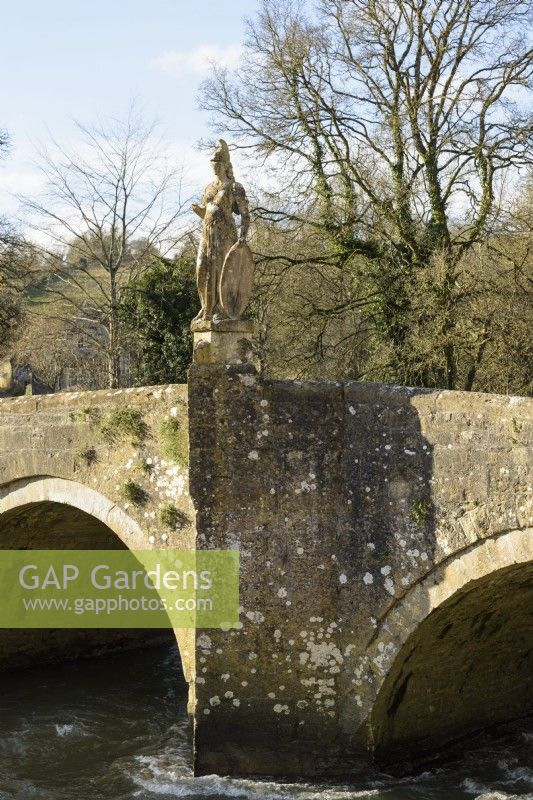 Statue of Britannia on a bridge over the River Frome beside Iford Manor