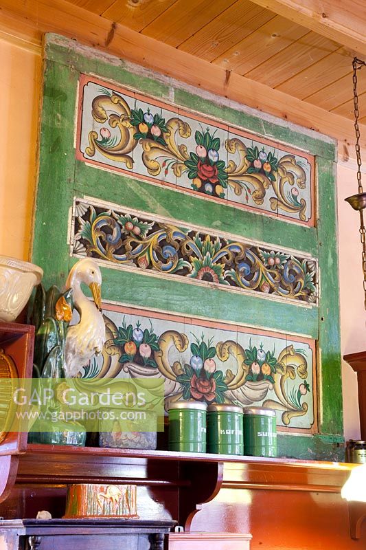 Wooden frieze from Norway in a kitchen-living room 