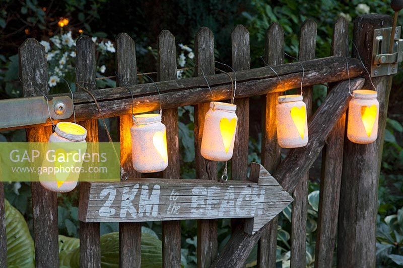Lanterns on a fence 
