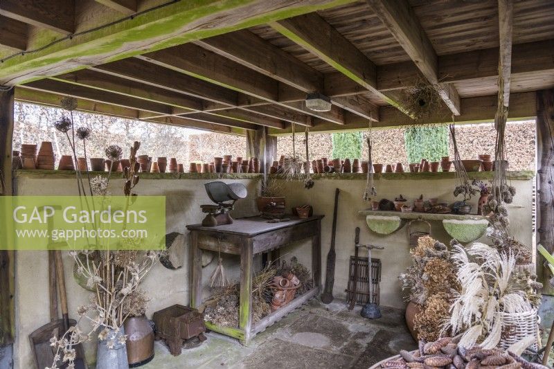 Covered potting shed at York Gate Garden in February
