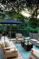 Contemporary urban garden with furniture 