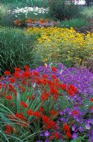 Summer border with perennials at Bressingham Gardens in Norfolk 