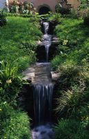 Water cascade in sloping garden at Chelsea FS 1999 