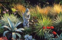 Statue amongst Agaves and other drought tolerant plants