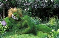 'Living' grass sculpture of dreaming girl. Sculptors - Sue Hill and Peter Hill