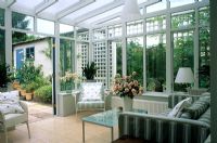 Conservatory interior with patio garden views.