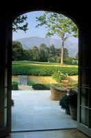 Views of gardens and mountains through doorway - Santa Barbara, Ca
