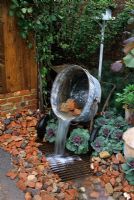 Water Feature - Water pouring from an old mixer