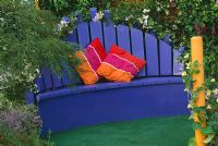 Blue wooden seat with cushions - The Sauk Ereisma Garden, Hampton Court 2003 