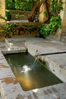Rectangular brick pool with rill - Gardens of the Alhambra, Granada, Spain 