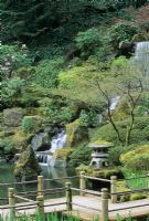 Japanese garden with pond and waterfall. Path deviates to confuse evil spirits - Japanese Garden, Portland, Oregon, USA