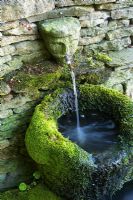 Ornamental splashing water feature with spout - Trench Hill garden, Gloucestershire 