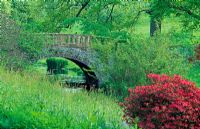 Eleanor's Bridge, designed and built by Admiral Robert Digby in 1785, crossing the River Cerne. Minterne Gardens, Nr Dorchester, Dorset.