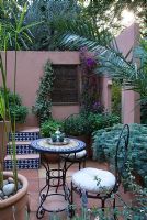 Moroccan style mediterranean courtyard with tiled fountain in the Garden - SPANA's Courtyard Refuge, Design - Chris O'Donoghue, Sponsor - Society for the Protection of Animals Abroad, RHS Chelsea Flower Show 2008