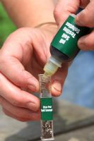 Soil testing for ph levels step 3 - Add the ph test solution up to the mark