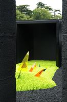 Gold medal Best Conceptual Garden Ecstasy in a Very Black Box represents feelings of constriction and release experienced by suffers of bipolar disorder. Design - Tony Smith - RHS Hampton Court Palace Flower Show