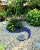 Central sweeping design in grey and blue gravel with shrub planting - Courtwood House, Staffs NGS