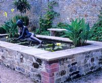 Raised pond with sculpture by Judith Holmes Drewry
